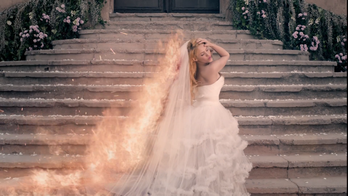 Shakira-Empire-music-video-fire-wedding-dress