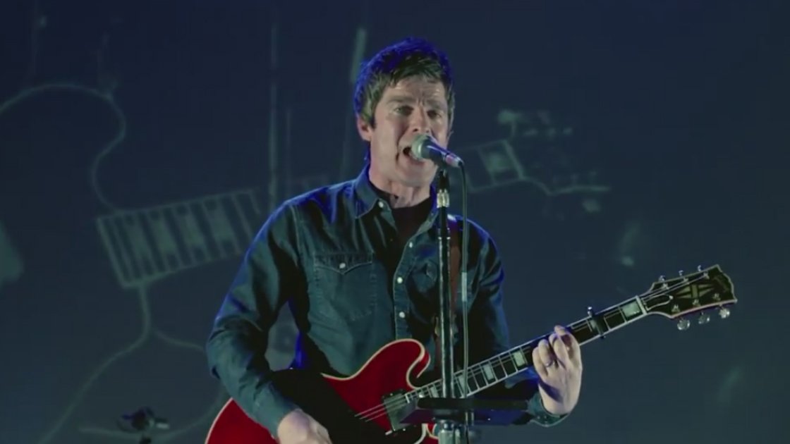 noel-gallagher-high-flying-birds-lock-all-the-doors-music-video-playing-guitar-singing