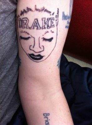 drake-girl-forehead-inception-tattoo