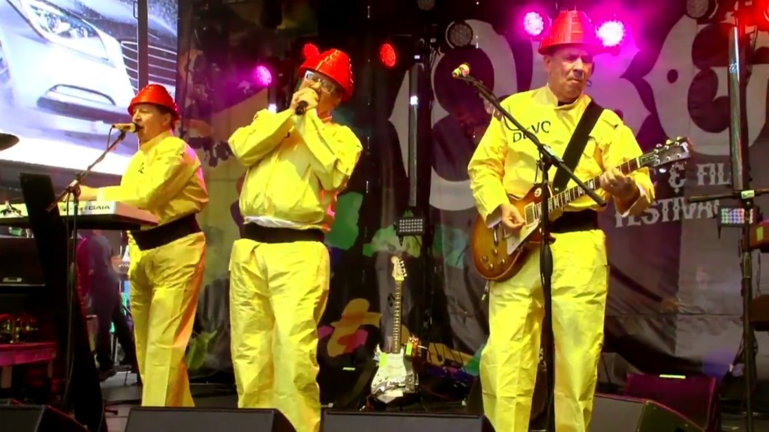 devo-yellow-suits-red-hats-times-square-nyc-cbgb-third-annual-music-and-film-festival-2014